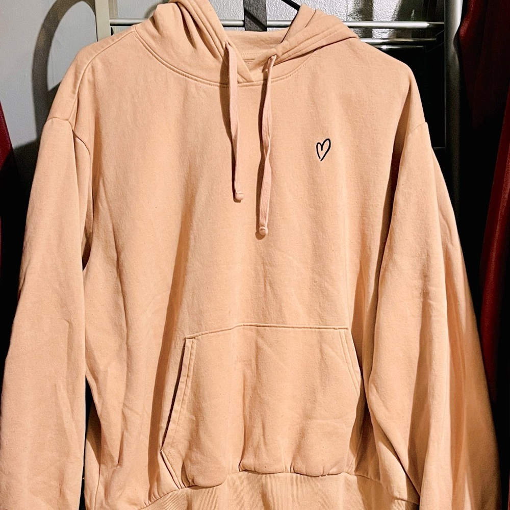 H&M Woman’s hooded sweatshirt. Size XL (runs small), color pink, lightly worn.
